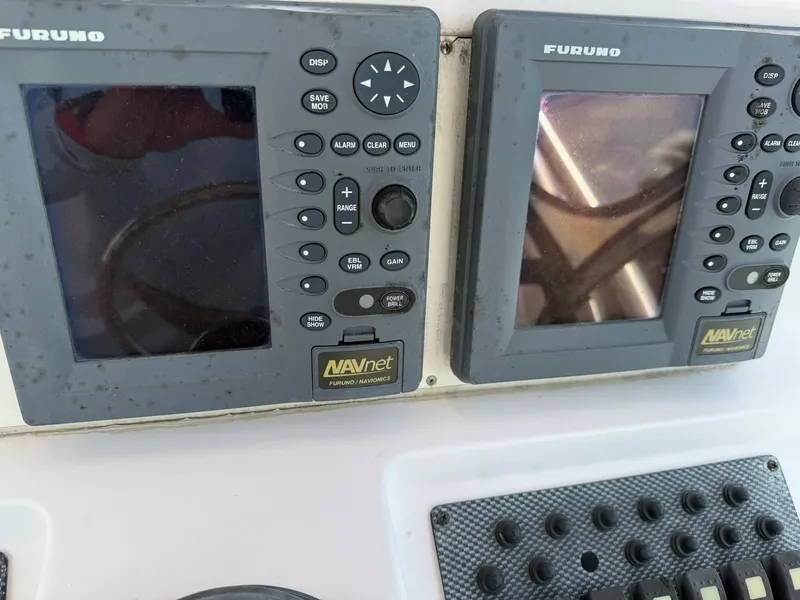 Slide: The Image of Furuno NAVnet marine electronics on 2003 Grady-White Sailfish 282 boat dashboard. - 8