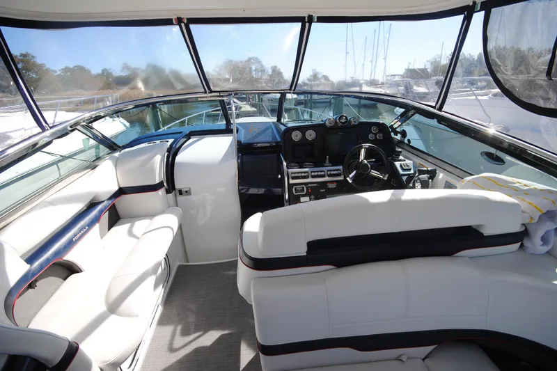 Slide: The Image of 2017 Formula 370 Super Sport boat interior with seating and table. - 4