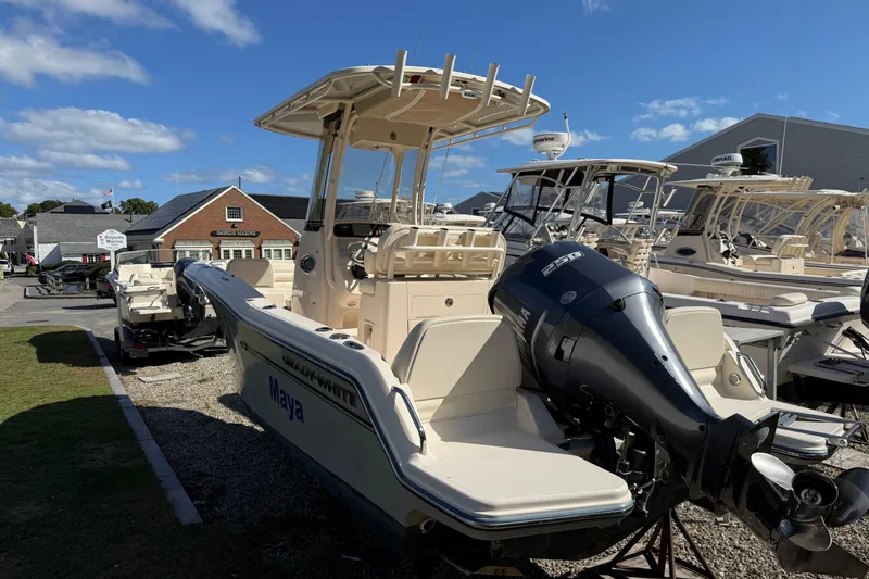 Slide: The Image of 2018 Grady-White Fisherman 216 boat with Yamaha engine, displayed outdoors at a marina. - 3