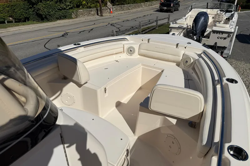 Slide: The Image of 2018 Grady-White Fisherman 216 boat interior with seating and storage compartments. - 6