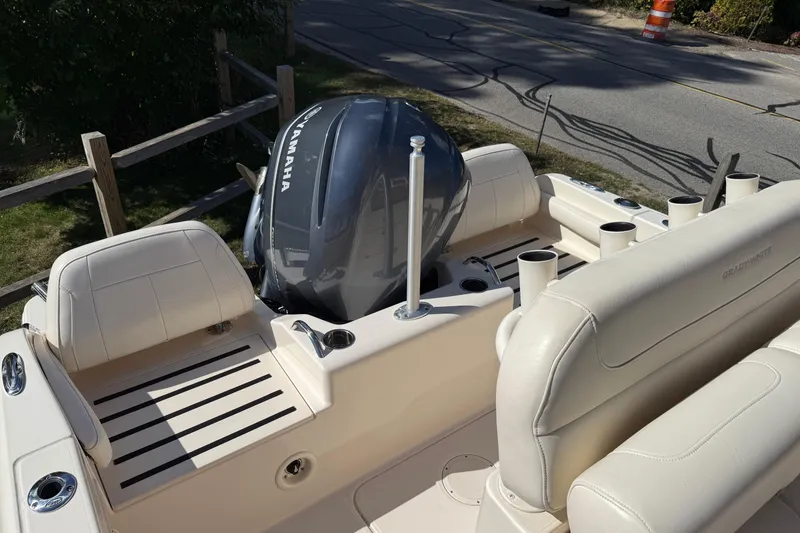 Slide: The Image of 2018 Grady-White Fisherman 216 boat with Yamaha engine, featuring comfortable seating and rod holders. - 7