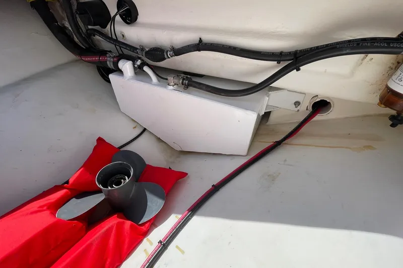 Slide: The Image of 2006 Chaos 16 Bonefish boat interior with propeller and wiring details. - 30