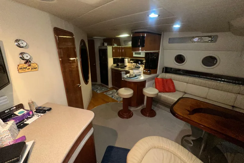 Slide: The Image of Luxurious interior of a 1998 Sea Ray 500 Sundancer yacht with modern amenities. - 3