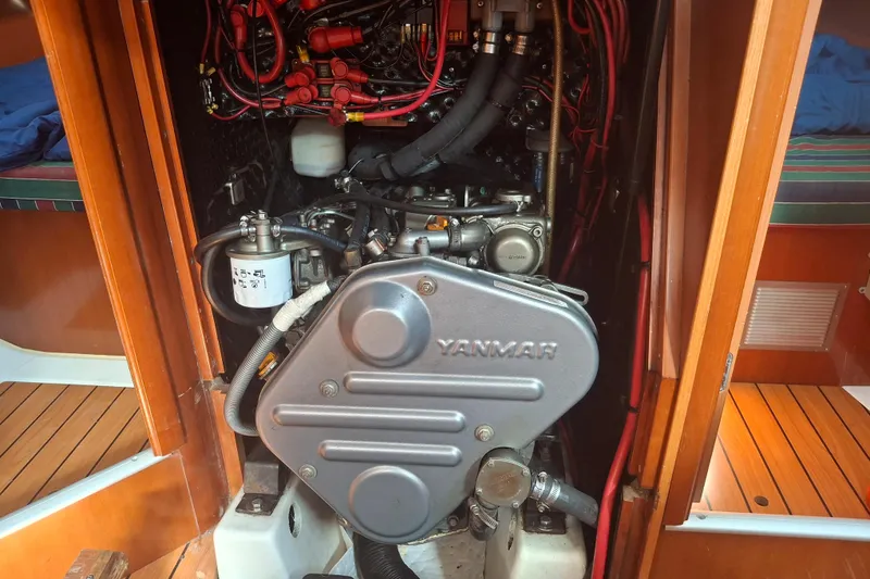 Slide: The Image of Engine compartment of a 2006 Beneteau Oceanis 393 sailboat with Yanmar engine. - 27