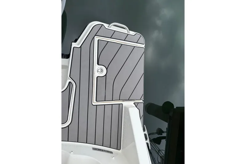 Slide: The Image of 2023 Sea Ray SLX 310 Outboard deck with sleek gray paneling. - 17