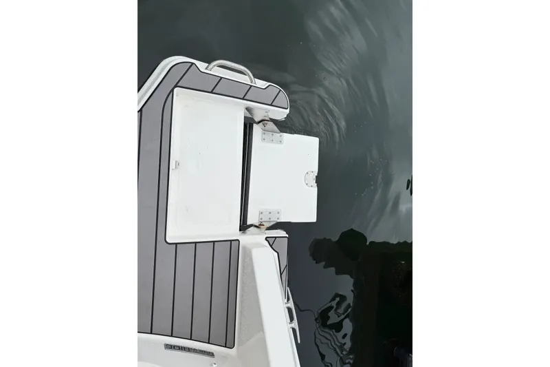 Slide: The Image of 2023 Sea Ray SLX 310 Outboard swim platform detail with water reflection. - 18