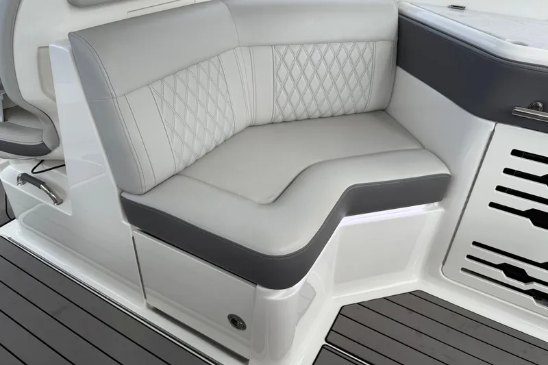 Slide: The Image of 2023 Sea Ray SLX 310 Outboard boat interior with luxurious seating and modern design. - 27