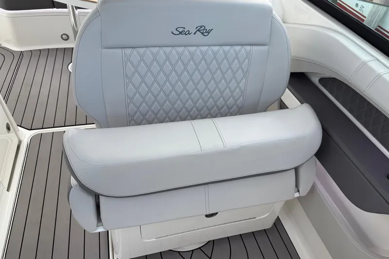 Slide: The Image of Luxury seating on 2023 Sea Ray SLX 310 Outboard boat, featuring elegant design and comfort. - 31