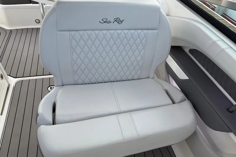 Slide: The Image of 2023 Sea Ray SLX 310 Outboard boat seat with elegant diamond stitching. - 32