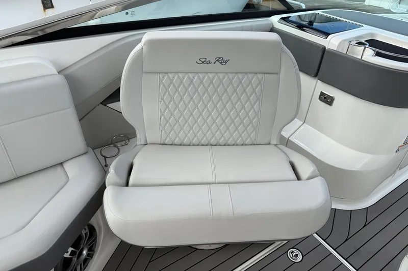 Slide: The Image of Luxurious seating on 2023 Sea Ray SLX 310 Outboard boat with elegant design and detailing. - 33
