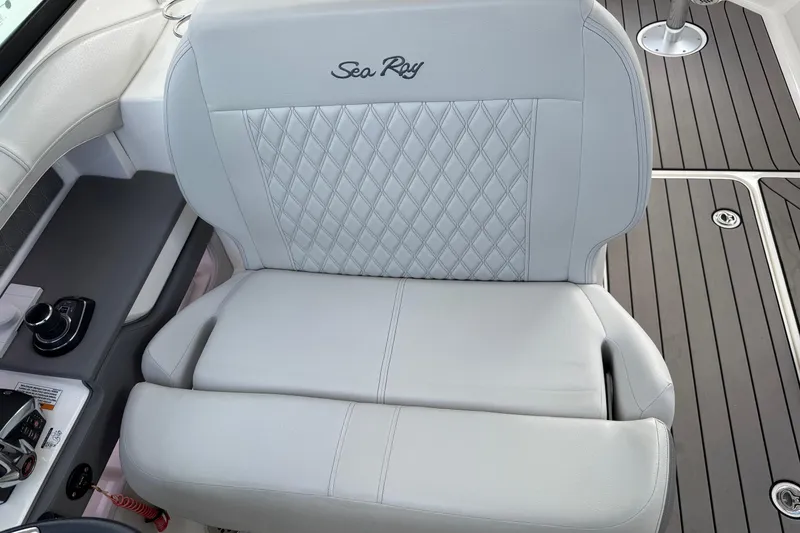 Slide: The Image of 2023 Sea Ray SLX 310 Outboard seat with diamond stitching and sleek design. - 39