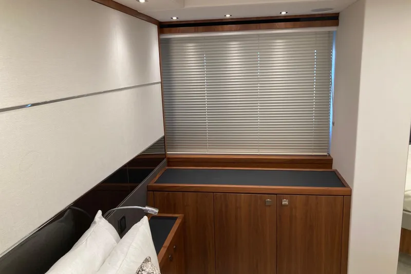 Slide: The Image of 2019 Sunseeker Predator 57 yacht on open water, rear view. - 12