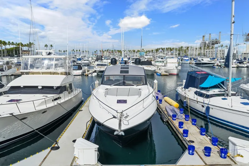 Slide: The Image of Overhead view of 2019 Sunseeker Predator 57 yacht on blue water. - 22