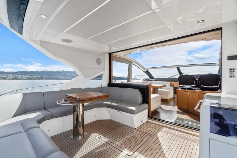 Slide: The Image of Luxurious interior of 2019 Sunseeker Predator 57 yacht with panoramic ocean views. - 32