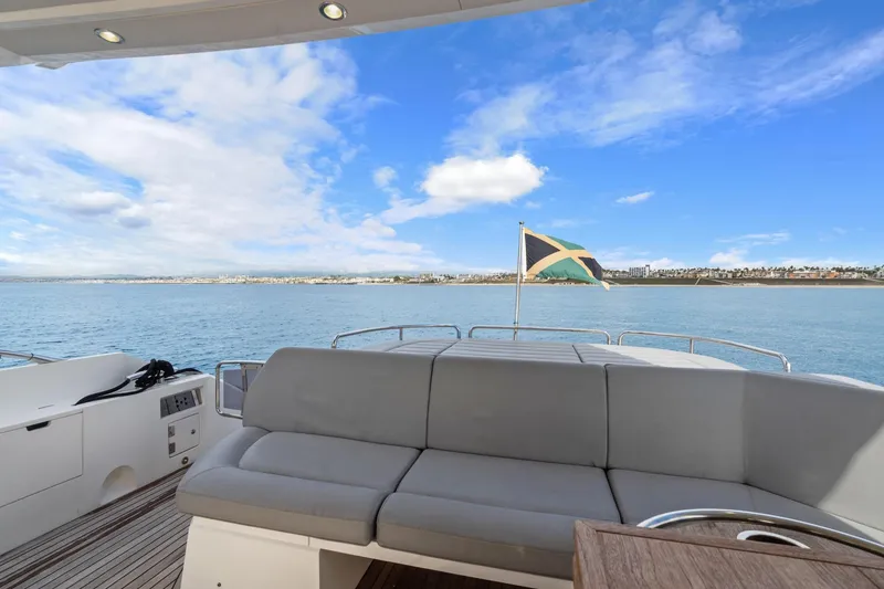 Slide: The Image of Luxurious 2019 Sunseeker Predator 57 yacht with spacious deck and scenic ocean view. - 33