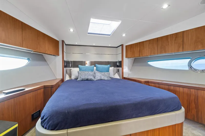 Slide: The Image of Luxurious interior of 2019 Sunseeker Predator 57 yacht with elegant wood finishes and seating. - 42
