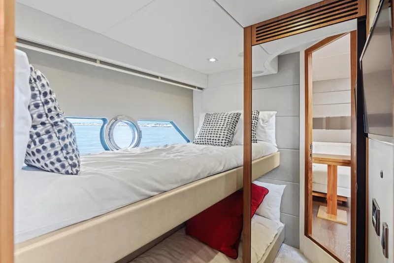 Slide: The Image of Luxurious bedroom interior of 2019 Sunseeker Predator 57 yacht with modern design elements. - 46
