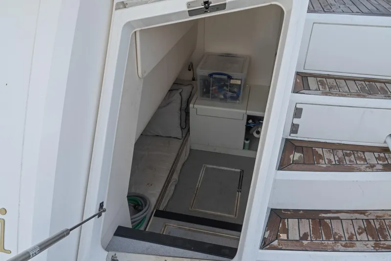 Slide: The Image of Luxurious bathroom in 2019 Sunseeker Predator 57 yacht with modern fixtures and wood accents. - 52