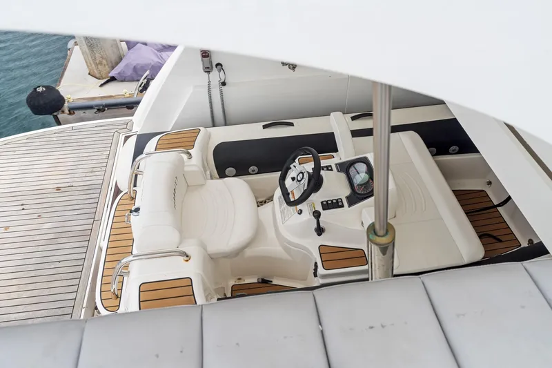 Slide: The Image of 2019 Sunseeker Predator 57 yacht with Williams Turbojet tender in storage compartment. - 56