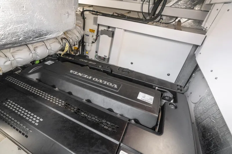 Slide: The Image of Engine room of 2019 Sunseeker Predator 57 yacht, showcasing advanced machinery and equipment. - 59