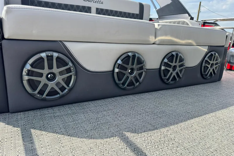 Slide: The Image of 2025 Barletta LUSSO 25UCAT boat with premium audio speakers and luxurious seating. - 17