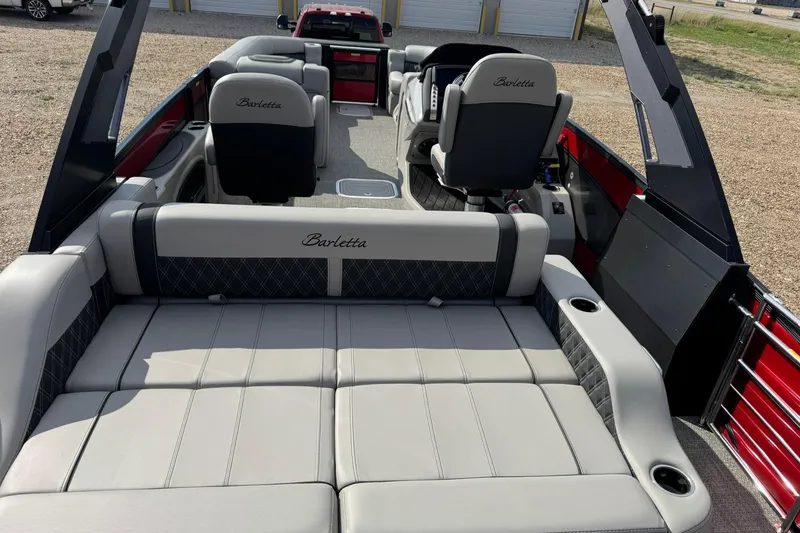 Slide: The Image of 2025 Barletta LUSSO 25UCAT pontoon boat interior with luxurious seating and modern design. - 19
