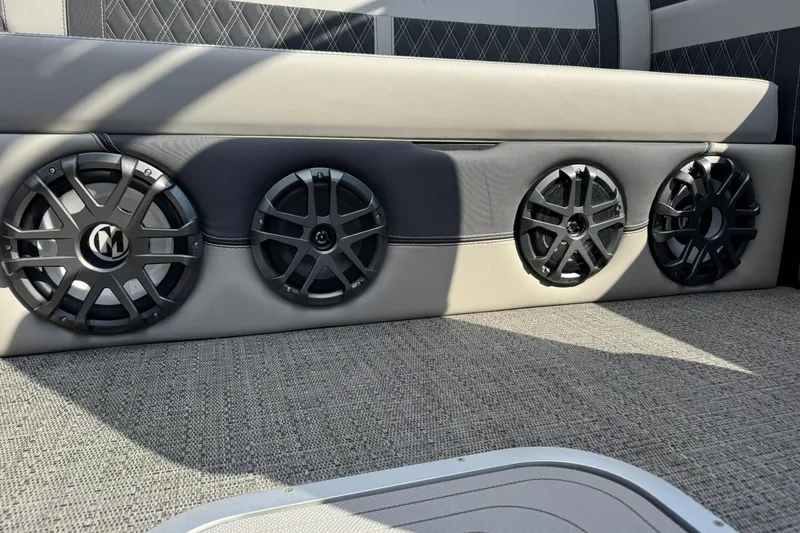 Slide: The Image of 2025 Barletta LUSSO 25UCAT boat interior with four sleek black speakers. - 29