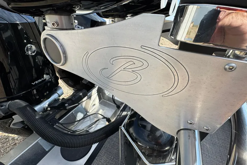 Slide: The Image of Close-up of Barletta LUSSO 25UCAT 2025 boat engine detail with logo. - 37