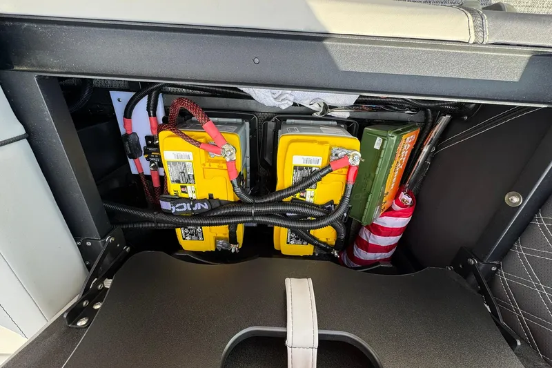 Slide: The Image of Battery compartment of 2025 Barletta LUSSO 25UCAT with wiring and accessories. - 38