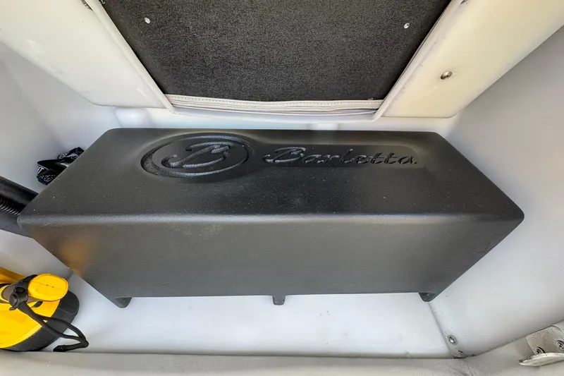 Slide: The Image of Barletta LUSSO 25UCAT 2025 boat compartment with branded cover and accessories. - 39