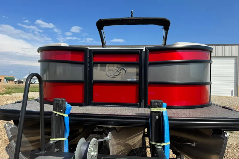 Slide: The Image of 2025 Barletta LUSSO 25UCAT pontoon boat with vibrant red and gray exterior. - 6