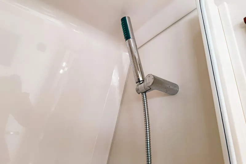 Slide: The Image of Showerhead in 2016 Pursuit OS 355 Offshore boat bathroom. - 41