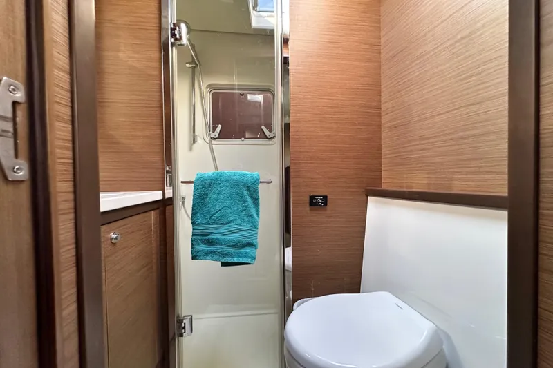 Slide: The Image of Bathroom interior of 2021 Lagoon 52 F yacht with shower and toilet. - 32
