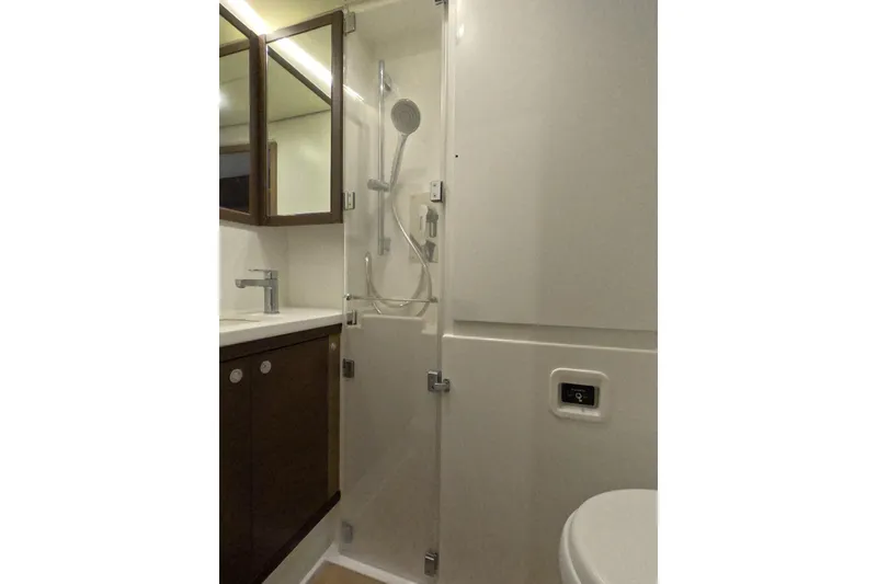 Slide: The Image of Modern bathroom interior of 2021 Lagoon 51 yacht, featuring shower and vanity. - 34