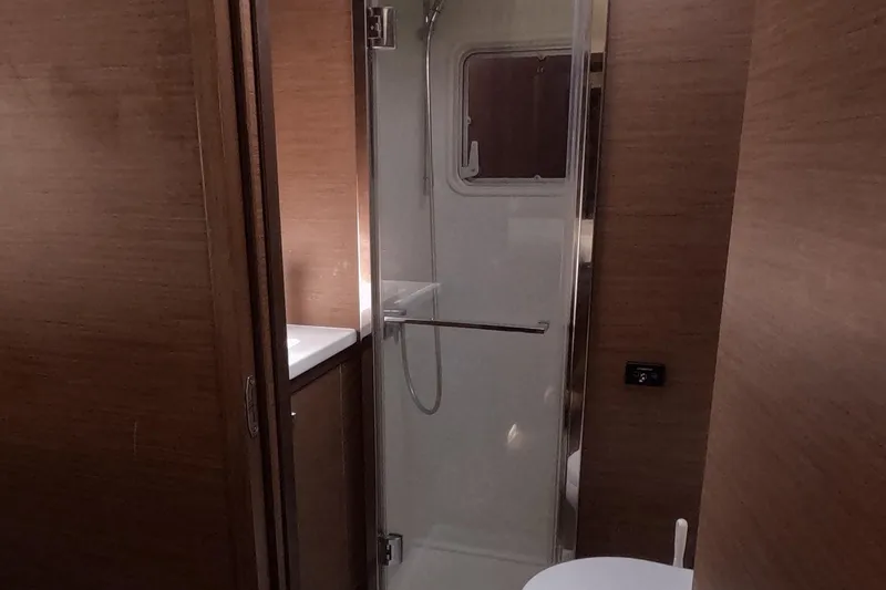 Slide: The Image of Bathroom interior of 2021 Lagoon 52 F yacht with shower and toilet. - 44