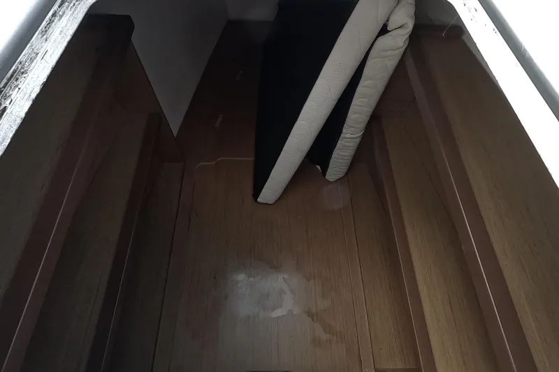 Slide: The Image of Interior storage space of 2021 Lagoon 51 yacht with wooden flooring. - 46