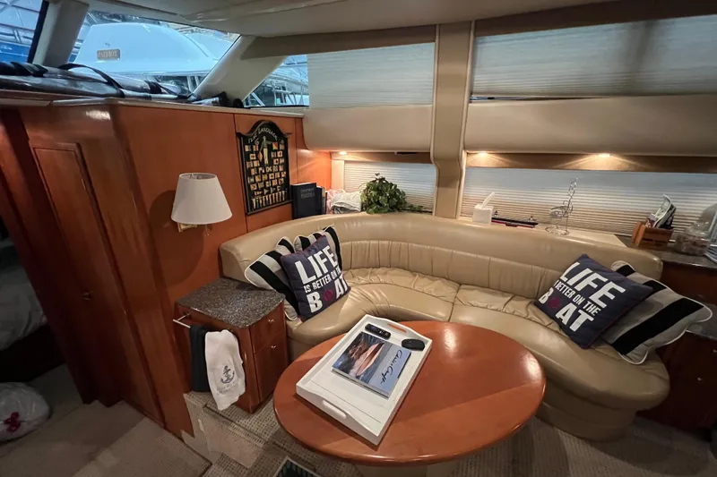 Slide: The Image of Luxurious interior of 2004 Meridian 408 Motoryacht with cozy seating and nautical decor. - 14