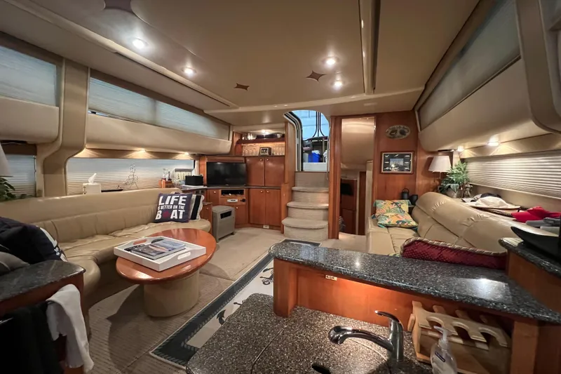 Slide: The Image of Luxurious interior of a 2004 Meridian 408 Motoryacht with cozy seating and modern amenities. - 16