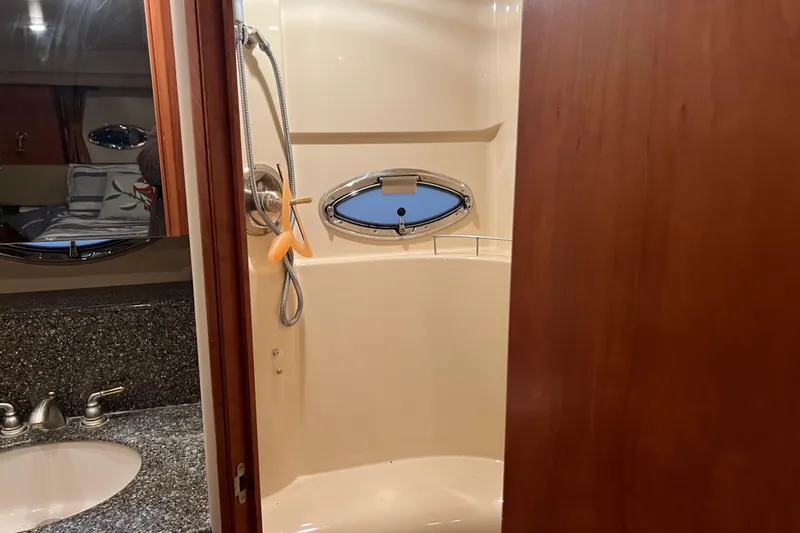 Slide: The Image of Bathroom interior of 2004 Meridian 408 Motoryacht with shower and sink. - 21