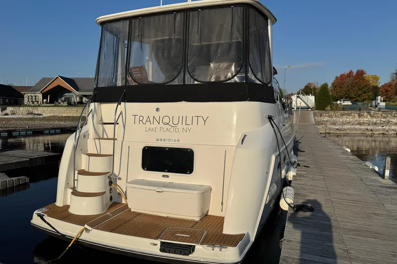 Slide: The Image of 2004 Meridian 408 Motoryacht docked at Lake Placid, NY, named "Tranquility". - 3