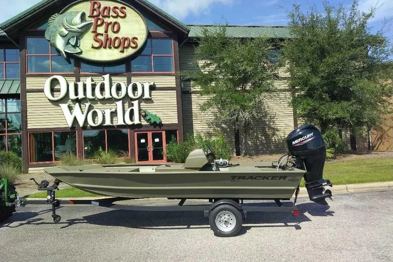 Slide: The Image of 2026 Tracker Grizzly 1648 SC boat outside Bass Pro Shops Outdoor World. - 5
