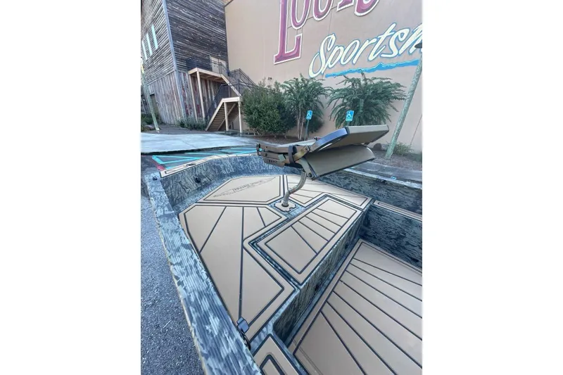 Slide: The Image of 2026 Tracker Grizzly 1650 T Prairie Wings Edition boat with camouflage design and seating. - 4