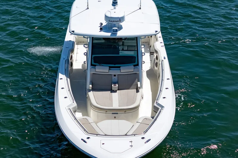 Slide: The Image of 2022 Boston Whaler 380 Outrage boat on water, aerial view. - 34