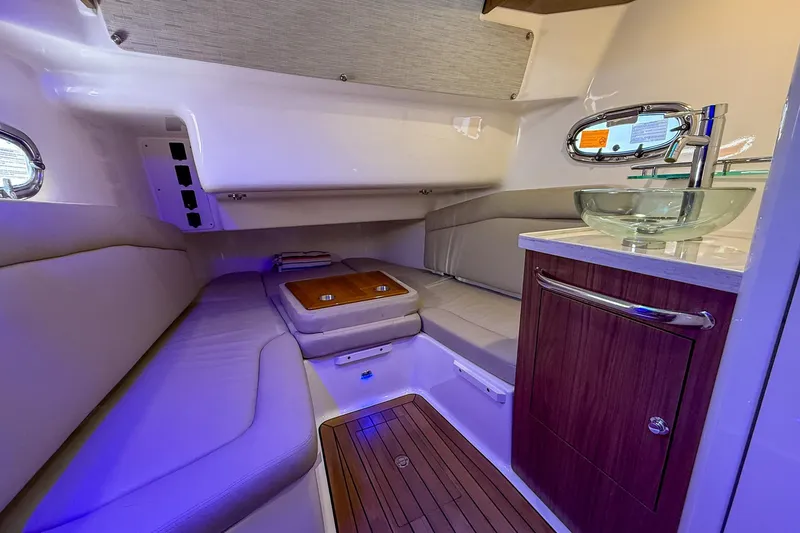 Slide: The Image of Luxurious interior of 2022 Boston Whaler 380 Outrage with modern seating and glass sink. - 65