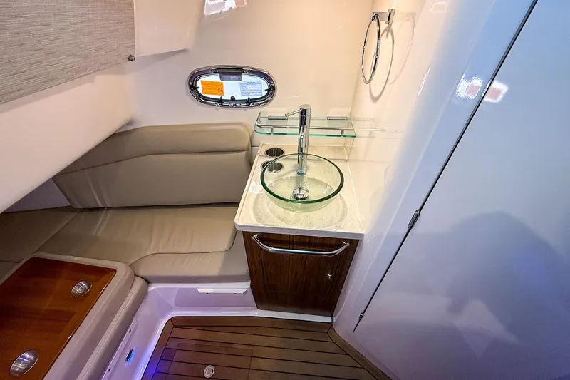 Slide: The Image of Luxurious interior of 2022 Boston Whaler 380 Outrage with modern sink and seating. - 68
