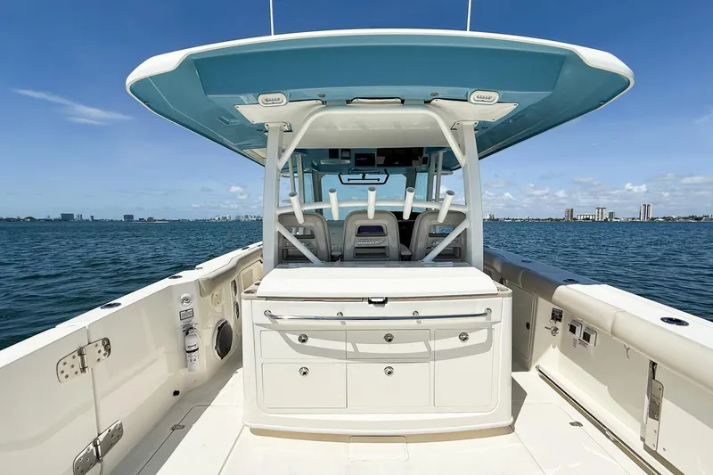 Slide: The Image of 2022 Boston Whaler 380 Outrage boat interior with ocean view and city skyline. - 71