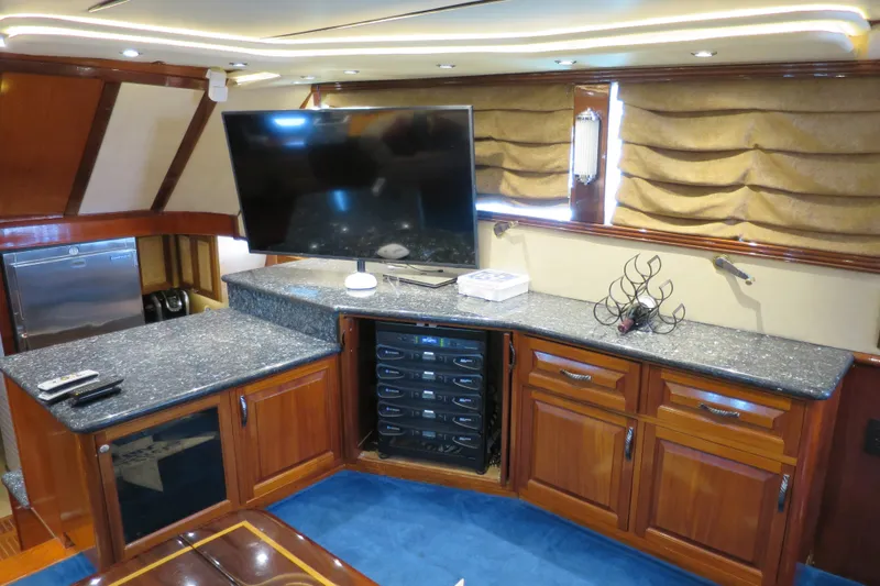 Slide: The Image of Luxurious 1964 Striker Cockpit interior with elegant wood finishes and plush seating. - 24