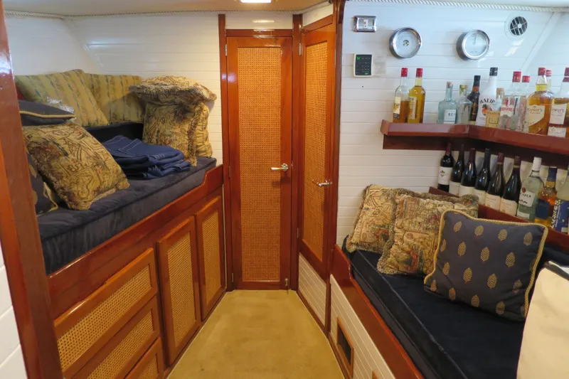 Slide: The Image of Luxurious 1964 Striker Cockpit interior with modern entertainment system and elegant wood cabinetry. - 25