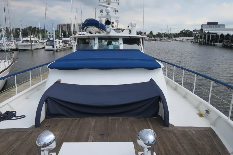 Slide: The Image of 1964 Striker Cockpit boat docked, featuring "Southern Star" name, clear skies, and waterfront homes. - 3