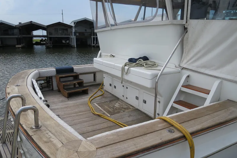Slide: The Image of 1964 Striker Cockpit boat with advanced navigation equipment under cloudy sky. - 5